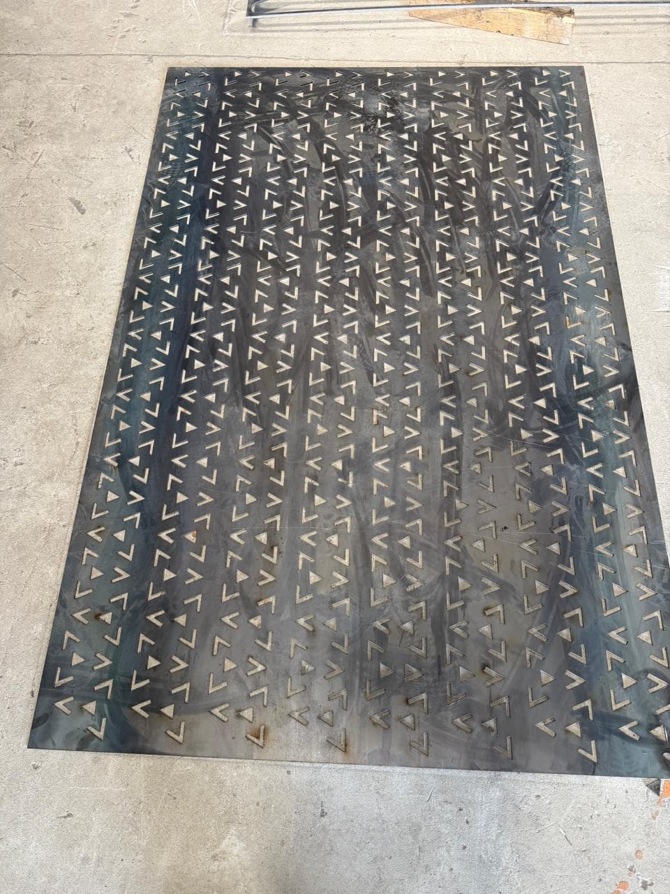 Full sheet laser cut with intricate triangular arrow pattern